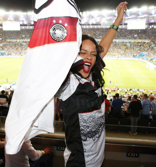 Rihanna celebrates Germanys World Cup win against Argentina By Flashing Her Bra